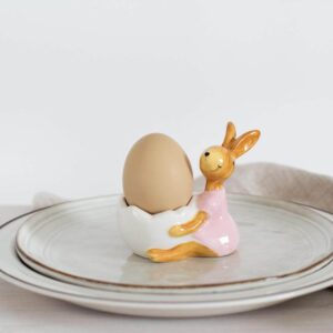 Velyku zuikiai laiko kiausinius, dėklas vaikams