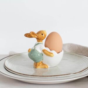 Velyku zuikiai laiko kiausinius, dėklas vaikams